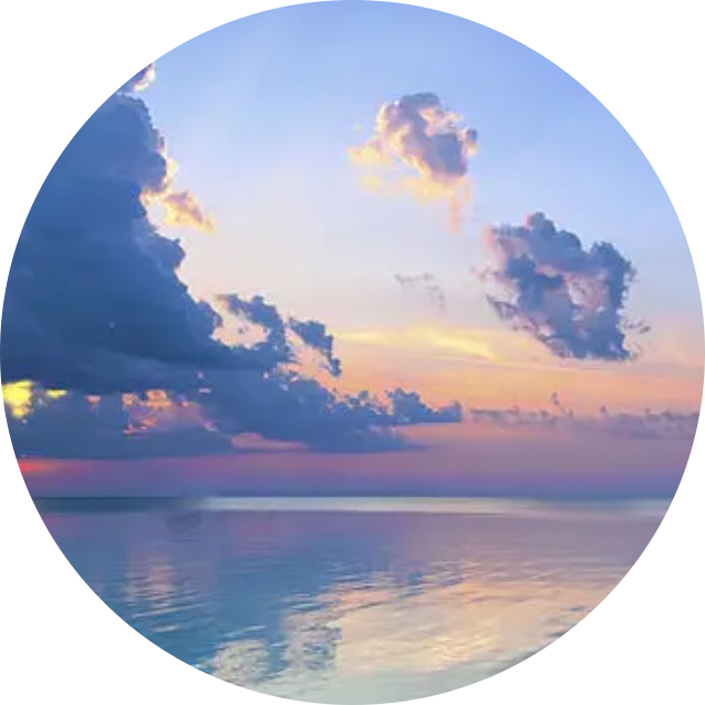 Lugn och vacker soluppgång vid havet, en symbol för Emotion Code